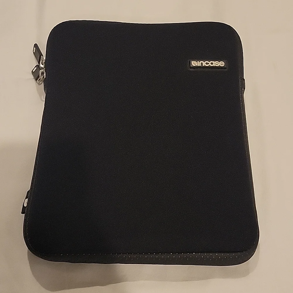 Padded tablet case with cleaning cloth